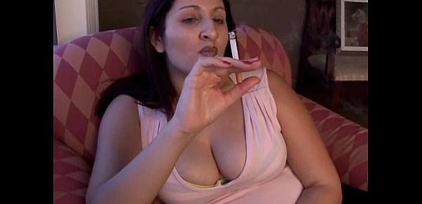  Cute chubby brunette loves to play with her body during a sexy smoke break